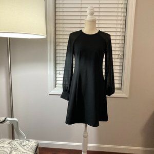 Black dress size 4. EUC. sheer long sleeves. Calvin Klein